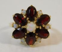 A 14ct gold opal & garnet ring by A & Z size M 5g