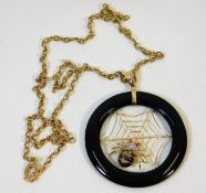 A 14ct gold chain with spider in web pendant set with black jade, abalone pearl, ruby & diamond 19g