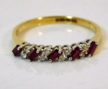 An 18ct gold diamond & ruby ring 2.8g size R