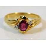 A 14ct gold ring set with ruby & diamond size M 2.