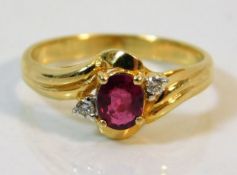 A 14ct gold ring set with ruby & diamond size M 2.