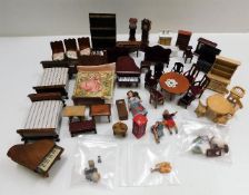 A quantity of mixed miniature dolls house figures