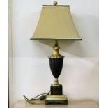 A decorative lamp with shade 28in tall