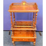 A c.1900 inlaid mahogany two tier Canterbury with