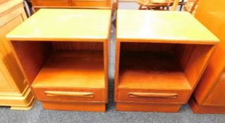 A pair of teak G-Plan bedside cupboards with drawe