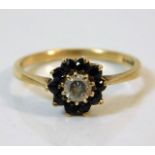A 9ct gold ring set with sapphire & white stone size O/P 2.1g