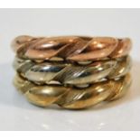 A 9ct three colour gold ring size Q/R 5.7g