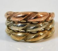 A 9ct three colour gold ring size Q/R 5.7g