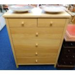 A modern oak style chest of drawers 41.5in high