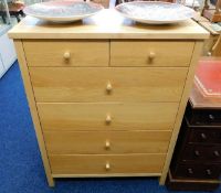 A modern oak style chest of drawers 41.5in high