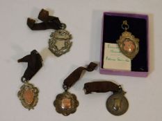 Five silver 1930's sports medals, three with rose