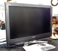 A Toshiba flat screen television approx. 37in