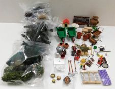 A quantity of mixed miniature dolls house figures