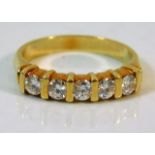 A yellow metal half eternity ring set with approx.