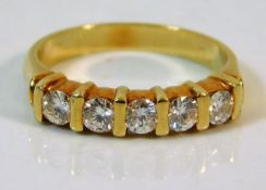 A yellow metal half eternity ring set with approx.