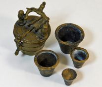 A brass Nuremberg style nested weights set