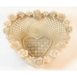 A Belleek porcelain bonbon basket, three tiny chip