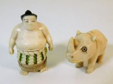 A carved Japanese netsuke, loss to toes twinned wi