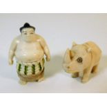 A carved Japanese netsuke, loss to toes twinned wi