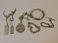 A silver Albert chain, two silver chains with ingo