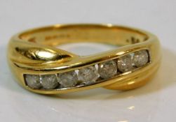 An 18ct gold ring set with approx. 0.5ct diamonds