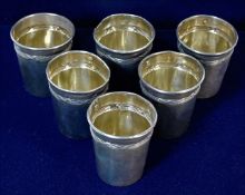 A set of six French 0.950 silver shots, some bumping approx. 51g