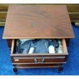 A small mahogany table with drawer & sewing conten