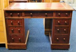 A small antique knee hole desk with nine drawers 4