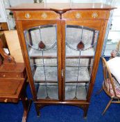 An art nouveau display cabinet