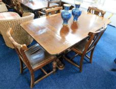 A c.1940 oak art deco style extending dining table