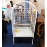 A parrot cage on wheels 61.5in tall