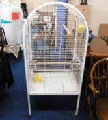A parrot cage on wheels 61.5in tall