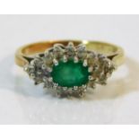 A 9ct gold diamond & emerald ring size J 2.1g