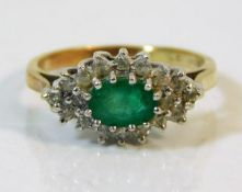 A 9ct gold diamond & emerald ring size J 2.1g
