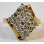 A 14ct gold ring set with 1.4ct diamonds size R 7.