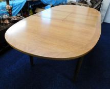 A Nathan teak extending dining table 81in long x 3