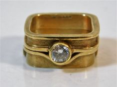 A 9ct gold two part square ring with CZ stone size