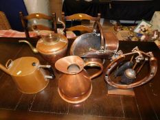 A copper haystack jug twinned with other copper &