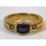 A 9ct gold ring set with tanzanite (small chip) &