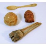 An early bone needle/scoop type item, an ivory spo
