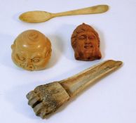 An early bone needle/scoop type item, an ivory spo