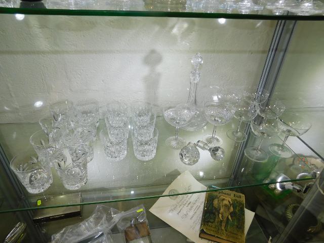 A quantity of drinking glasses including champagne