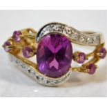 A 9ct gold ring set with diamond & amethyst size P