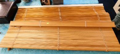 A pair of wooden blinds 51.5in wide