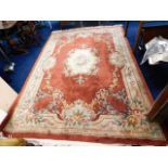 A large Chinese wool rug 120in long x 84in wide ex