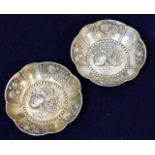 A pair of decorative German silver trinket dishes