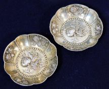 A pair of decorative German silver trinket dishes