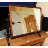 An oak framed dressing table mirror