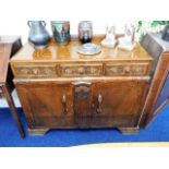 A c.1940 oak art deco style sideboard with drawers