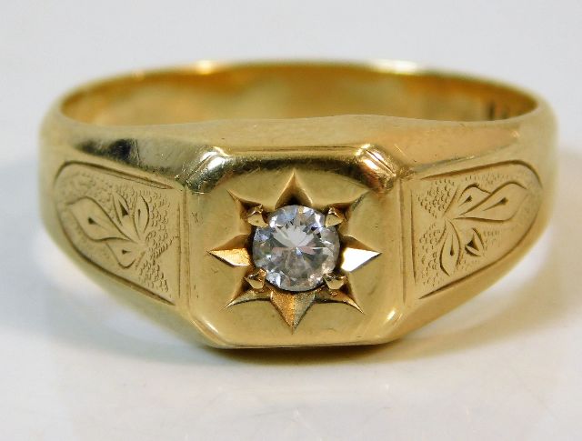 A large 14ct gold ring set with approx. 0.21ct dia